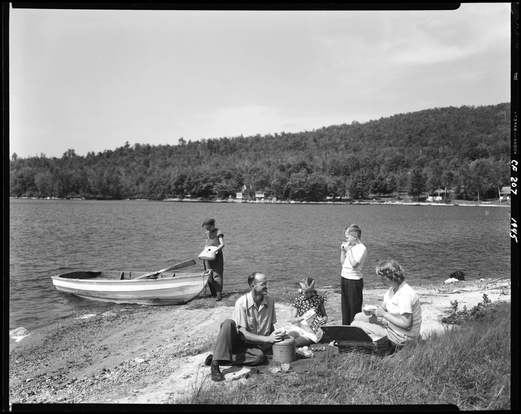 Miniature of Family Eating A Picnic Lunch At A Lakeside Beach In Porter