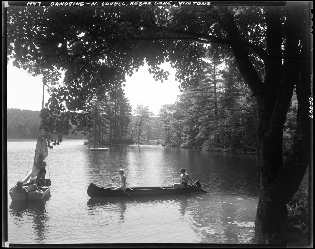 Miniature of A Couple In A Canoe Meeting Another Boat On Lake Kezar In North Lovell