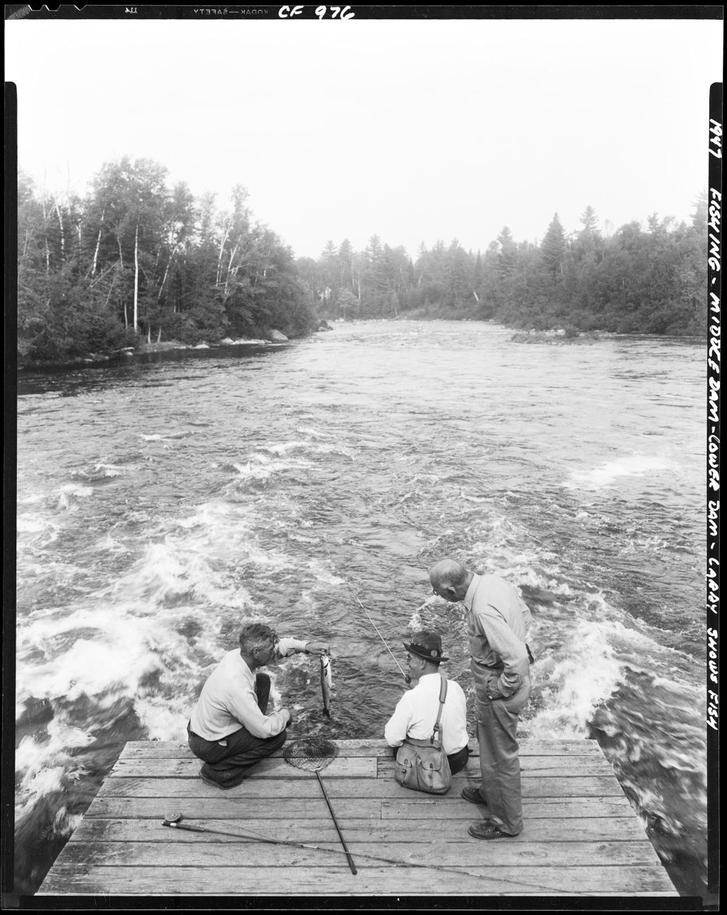 Miniature of Three Men Fly-Fishing From A Dock, One Has Just Landed A Fish At Middle Dam