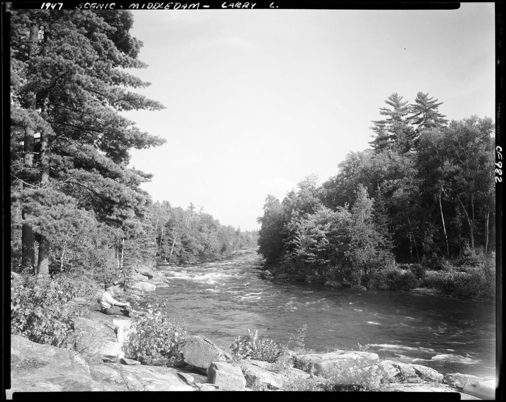 Miniature of Man Sitting On Rocks Beside Stream At Middle Dam