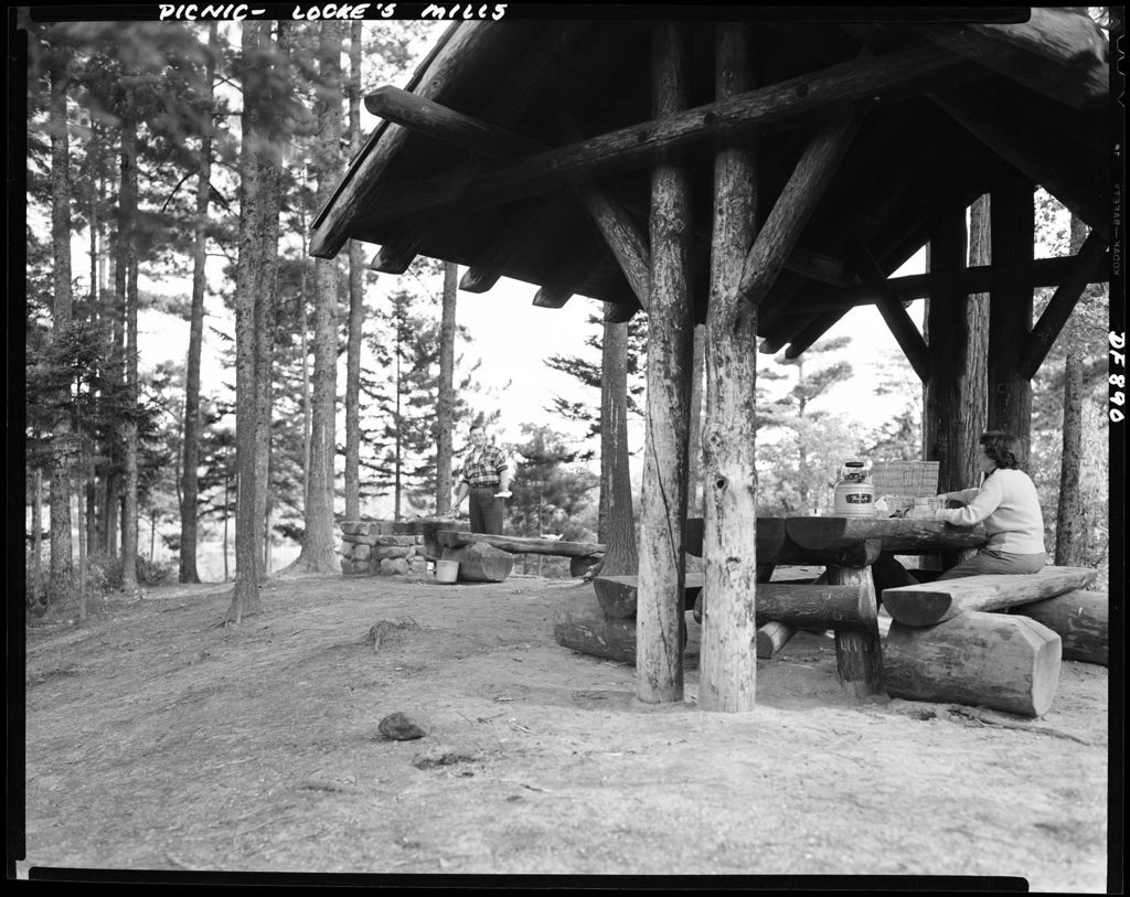Miniature of Couple Setting Up For A Picnic Lunch At A Roadside Picnic Area In Locke's Mills