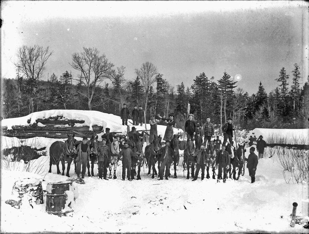 Miniature of Snow covered winter scene of a logging camp with many men and horses