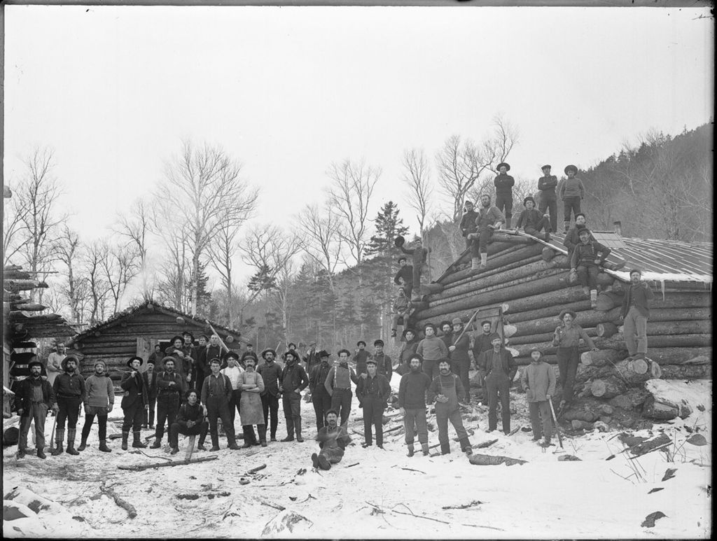 Miniature of Winter scene of many men at a logging camp