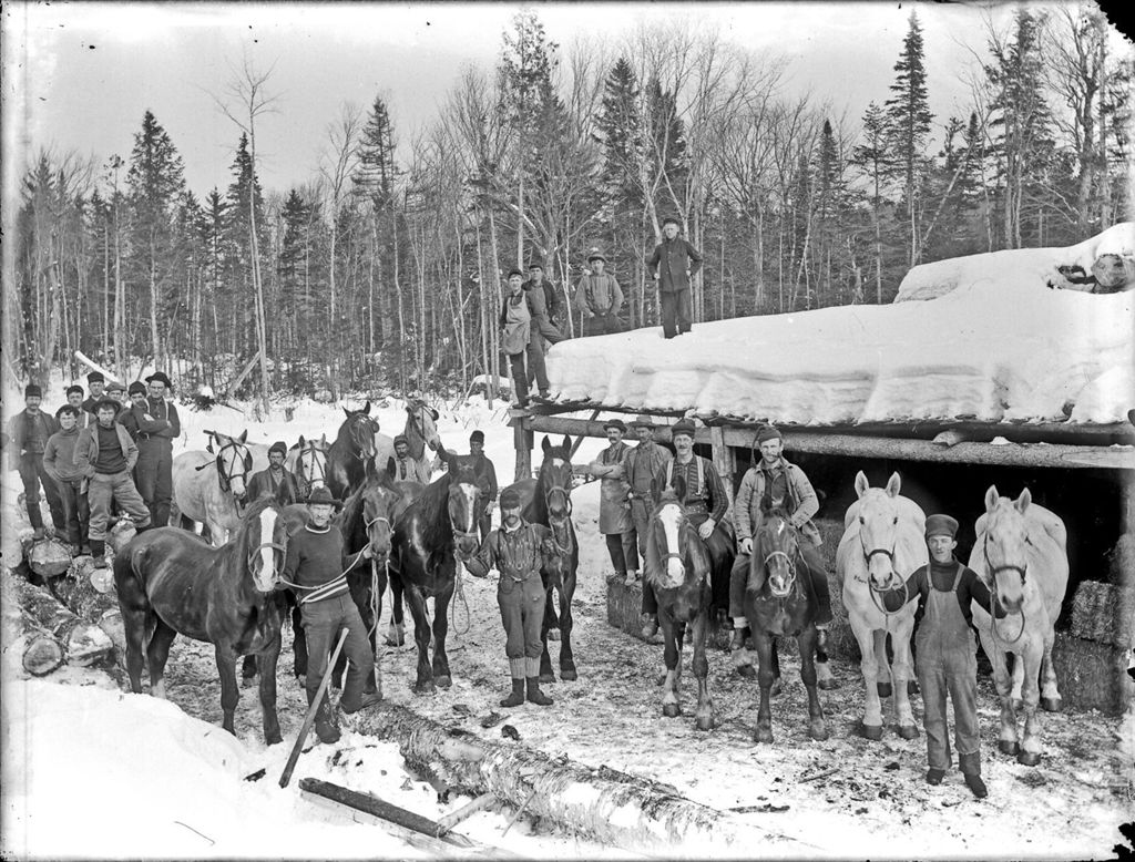 Miniature of Snow covered winter scene of a logging camp with many men and horses