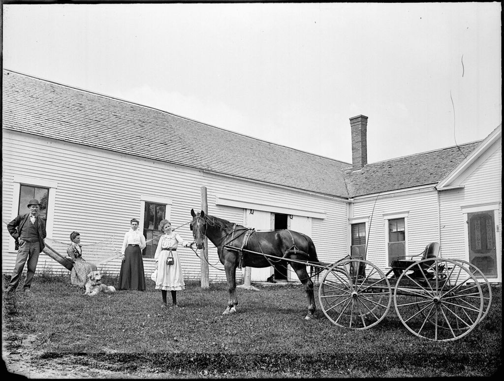 Miniature of Family posing outside their rural home and barn with dog and horse with carriage