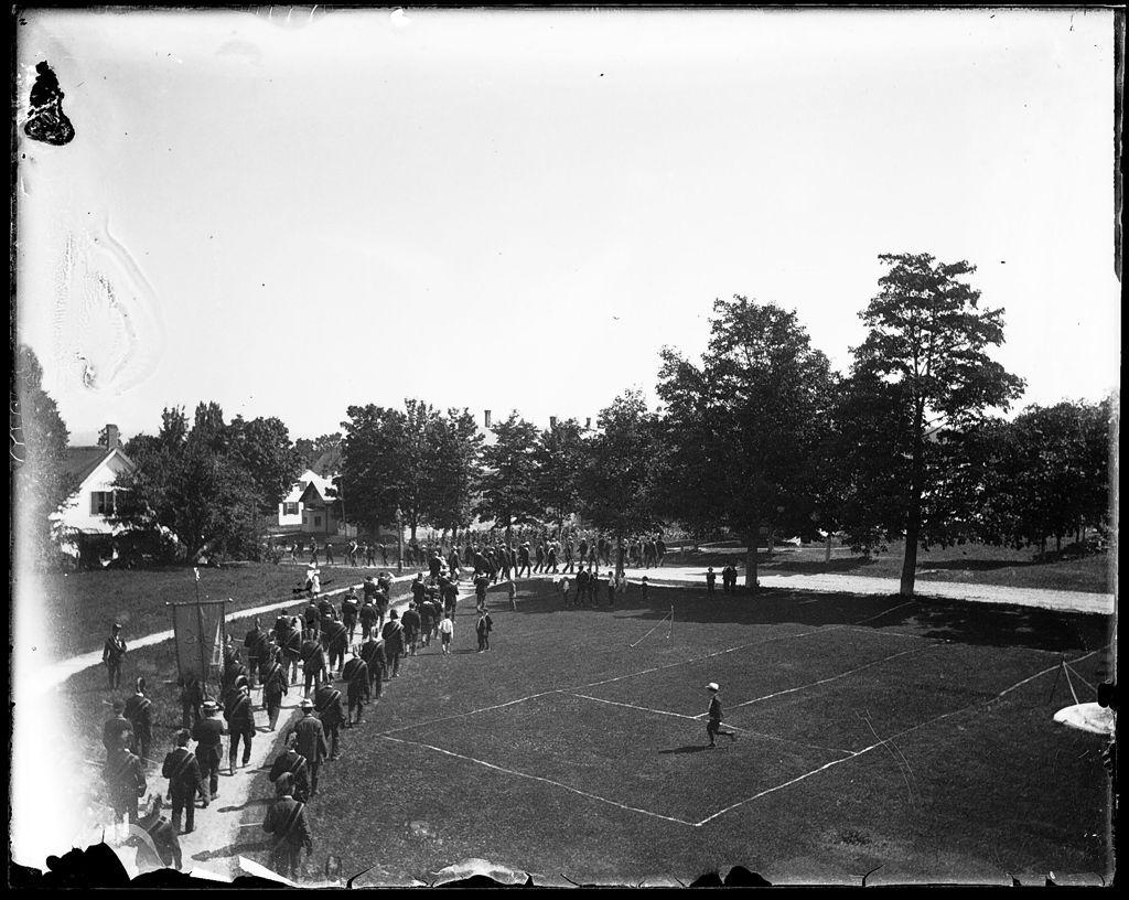 Miniature of Marching band and parade procession going through town