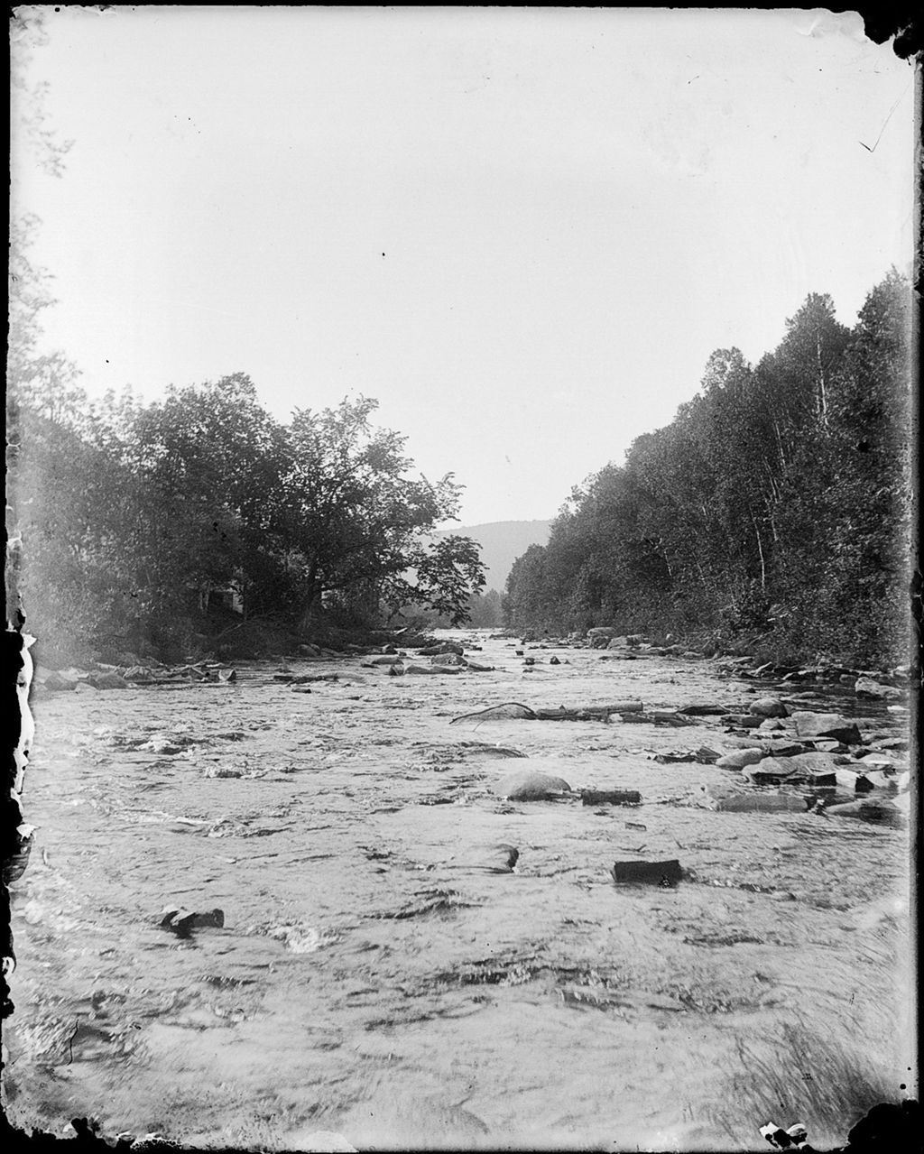 Miniature of View of a wide, rocky and rushing wooded stream, rising hill in the distance